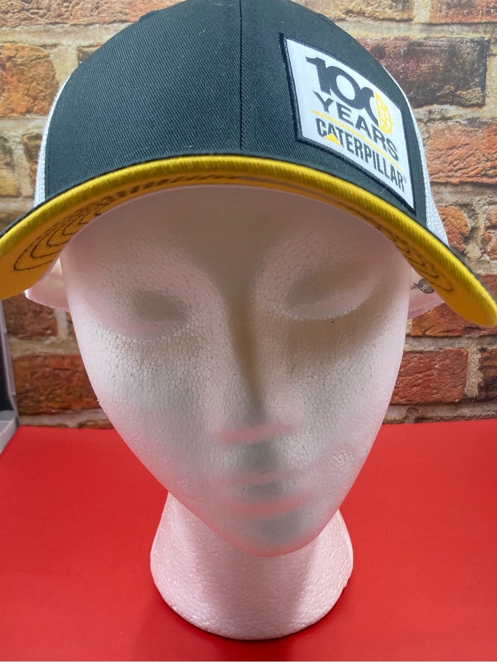 Caterpillar Black, White & Yellow Mesh Trucker Hat